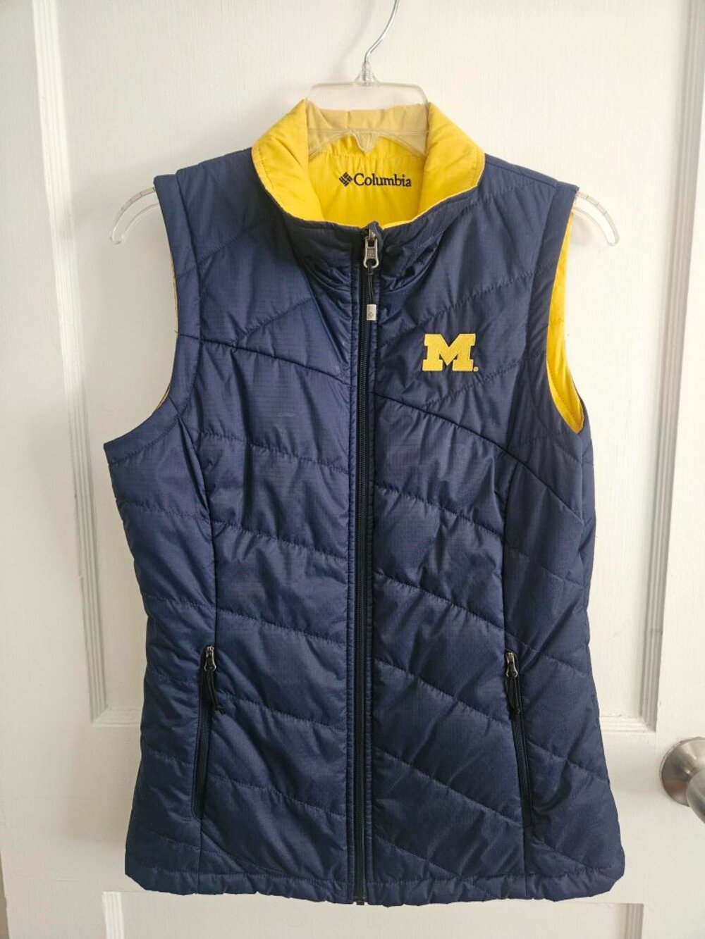 Columbia Michigan Wolverines reversible puffer vest in classic maize and navy